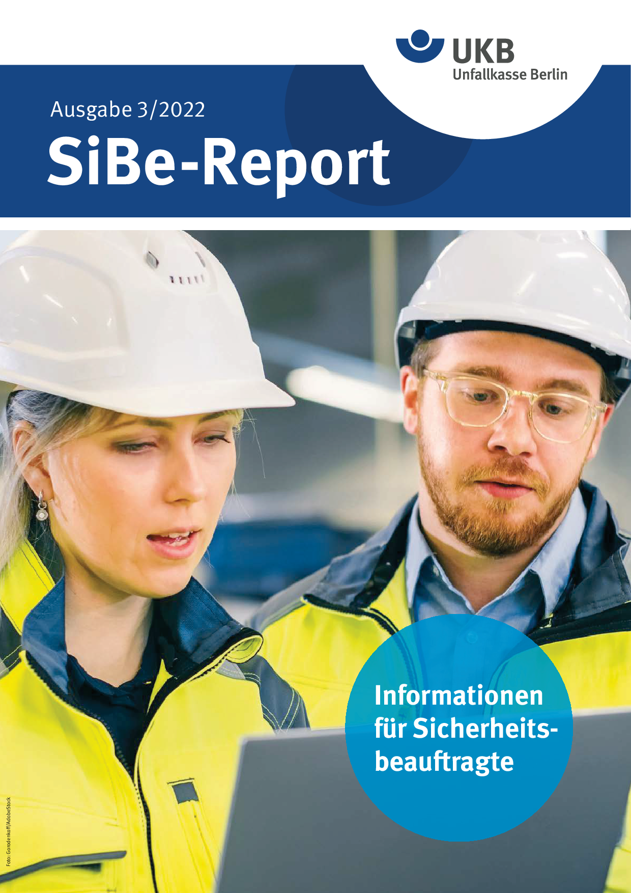 SiBe-Report 3/2022: Zwei Personen in Warnkleidung mit Laptop